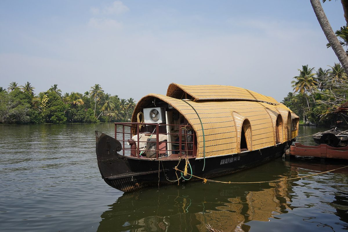 A thatched Kerala houseboat moored on the Alappuzha backwaters.